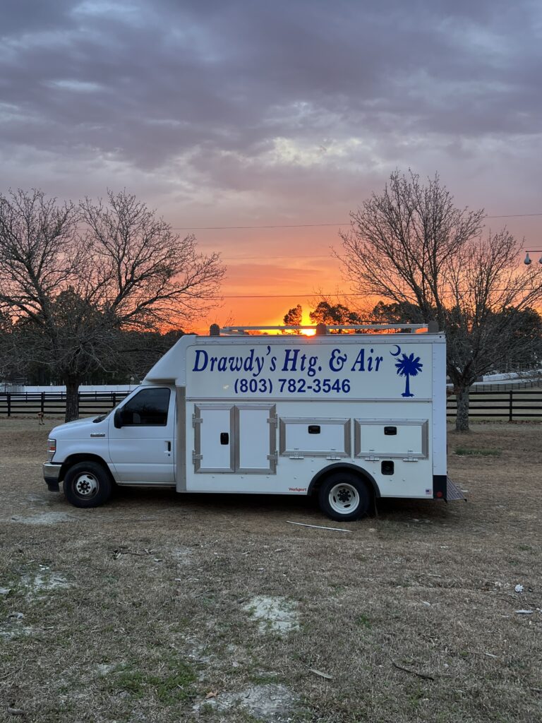 Drawdy’s Heating and Air service truck at sunset