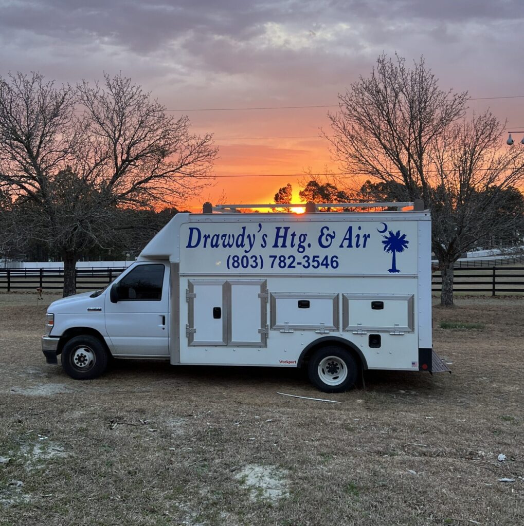 Drawdy’s Heating and Air service truck at sunset